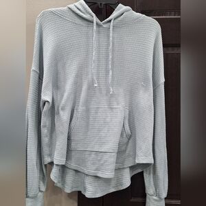 Women's light blue sweater with hood